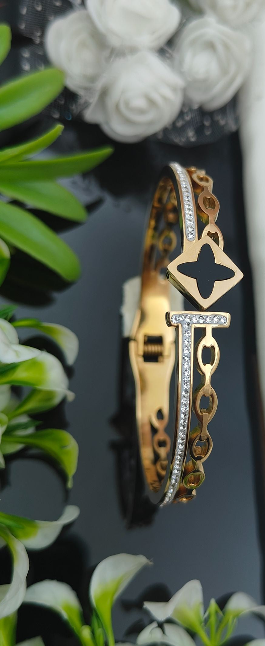 Black Flower AD with Golden Bracelet