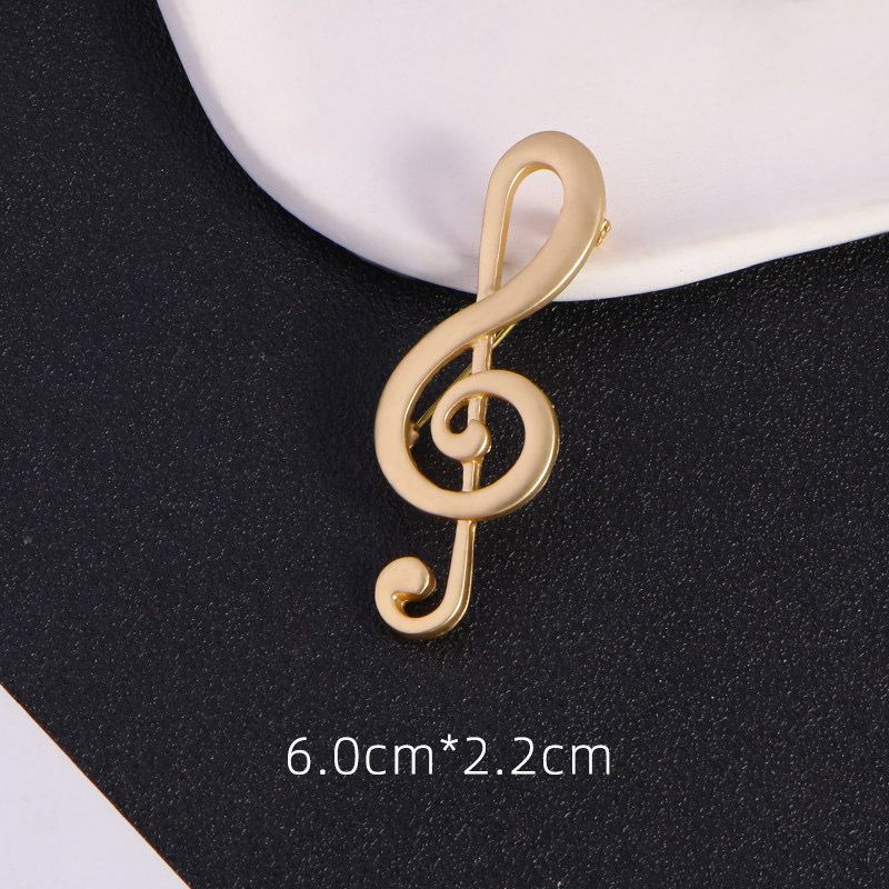 Elegant treble clef Brooch