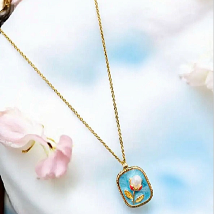 Protuding Coloured Flower with Pearl Pendant